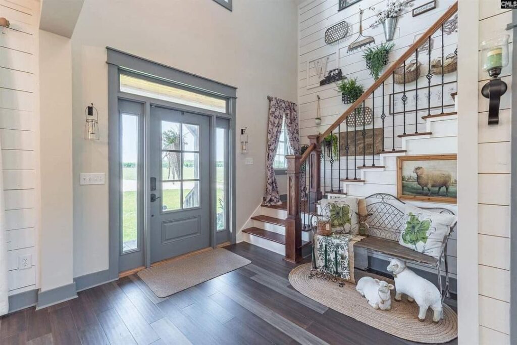 May be an image of lighting, indoors, barn door and living room